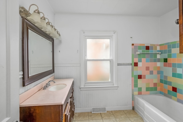 bathroom featuring vanity and a bathing tub