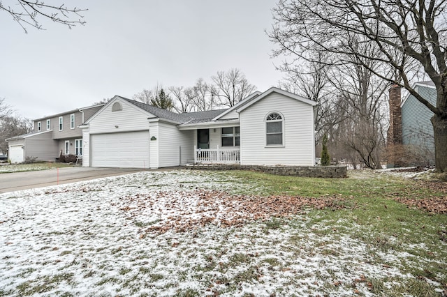 view of front facade featuring a porch and a garage