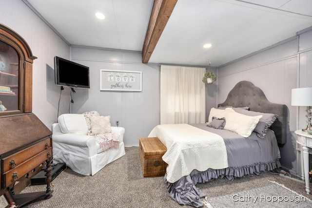 carpeted bedroom featuring beam ceiling