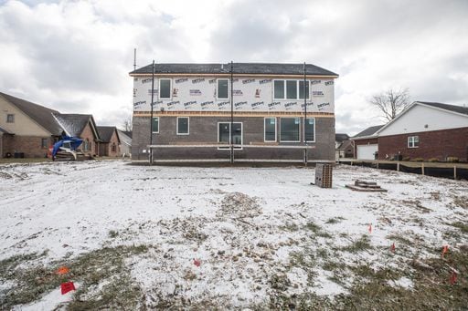 view of snow covered property