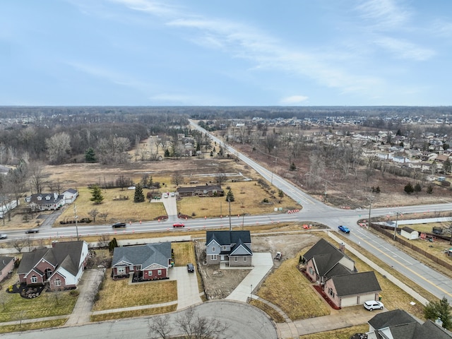 birds eye view of property with a residential view