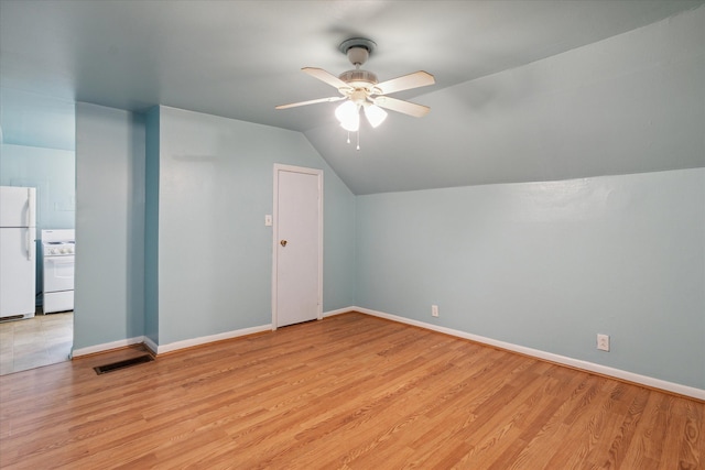 bonus room featuring light hardwood / wood-style flooring, ceiling fan, and lofted ceiling