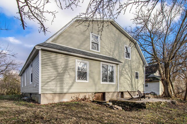 rear view of house with a patio