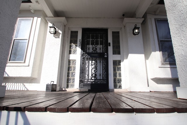 entrance to property featuring a deck