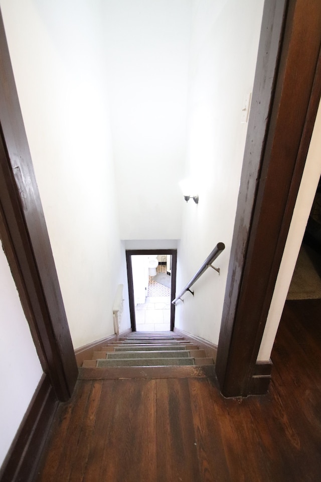 stairway with wood-type flooring