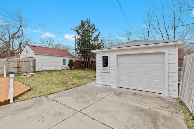 garage with a yard