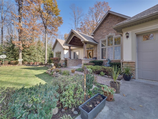 exterior space with a front yard and a garage