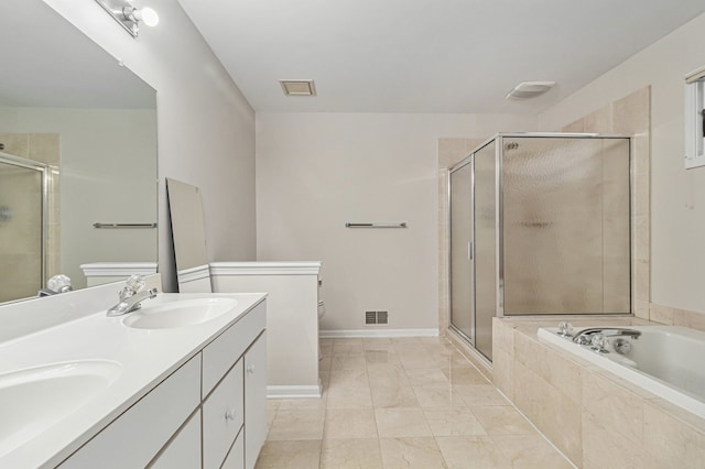 full bathroom with tile patterned flooring, shower with separate bathtub, vanity, and toilet