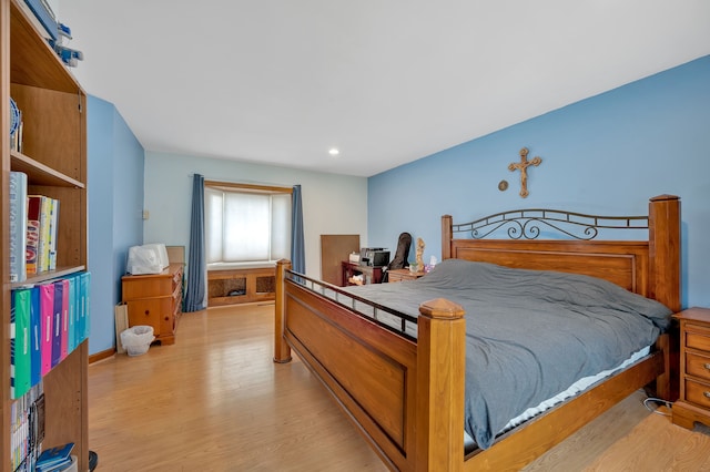 bedroom featuring light hardwood / wood-style floors