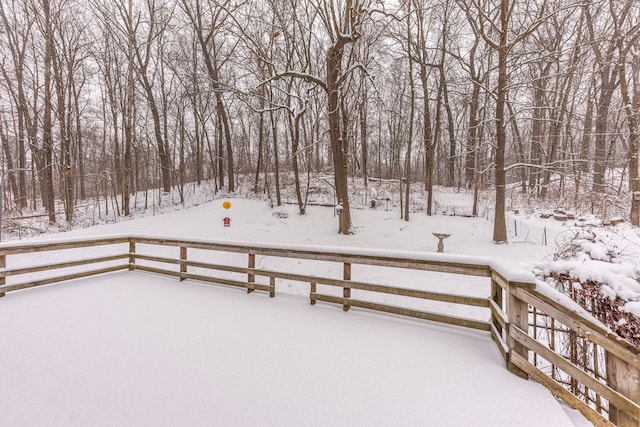 view of snow covered deck