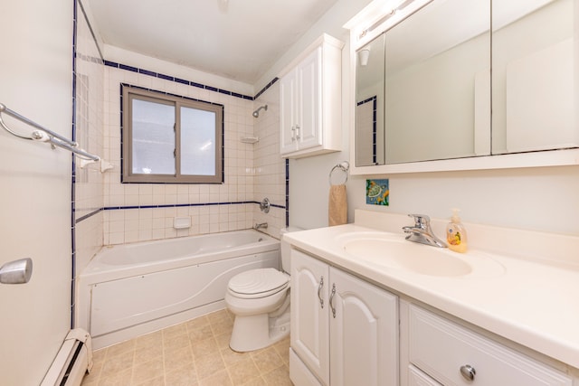 full bathroom with vanity, toilet, tiled shower / bath combo, and a baseboard radiator