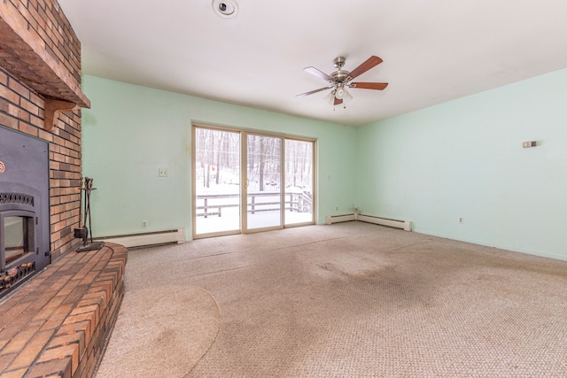 unfurnished living room with a fireplace, carpet, a baseboard radiator, and ceiling fan