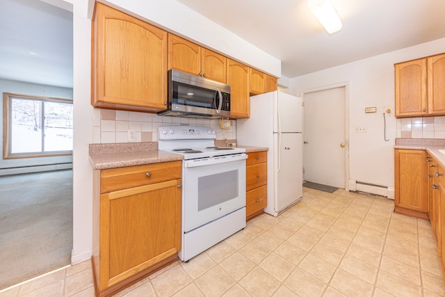 kitchen with light colored carpet, white appliances, baseboard heating, and tasteful backsplash