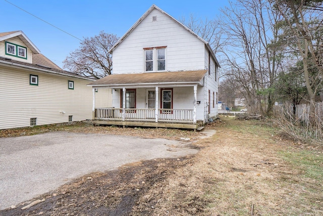 view of front of home featuring covered porch