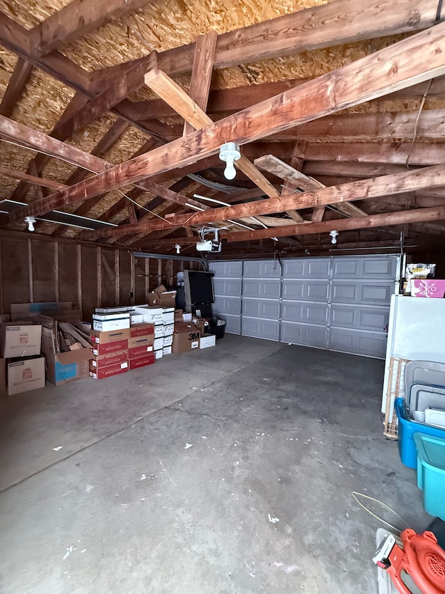 garage featuring a garage door opener