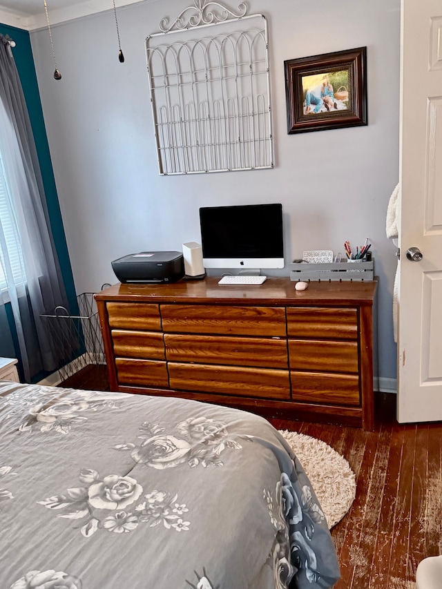 bedroom featuring dark hardwood / wood-style floors