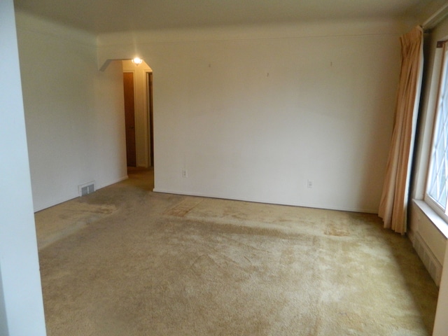 view of carpeted spare room