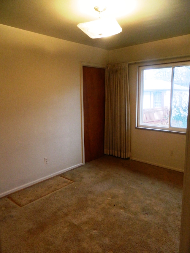 view of carpeted spare room