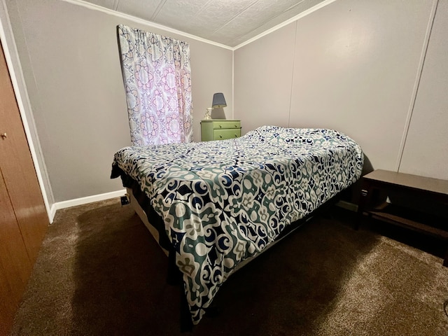 carpeted bedroom featuring crown molding