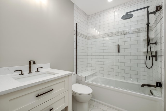 full bathroom with vanity, toilet, and combined bath / shower with glass door