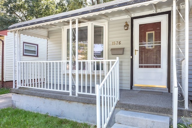 property entrance with a porch