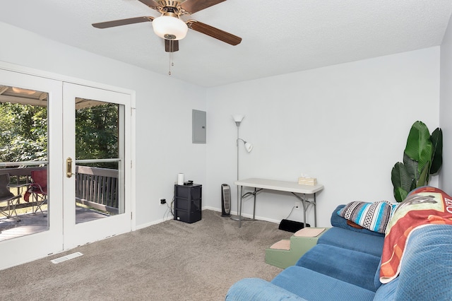 living room with carpet, ceiling fan, electric panel, and french doors