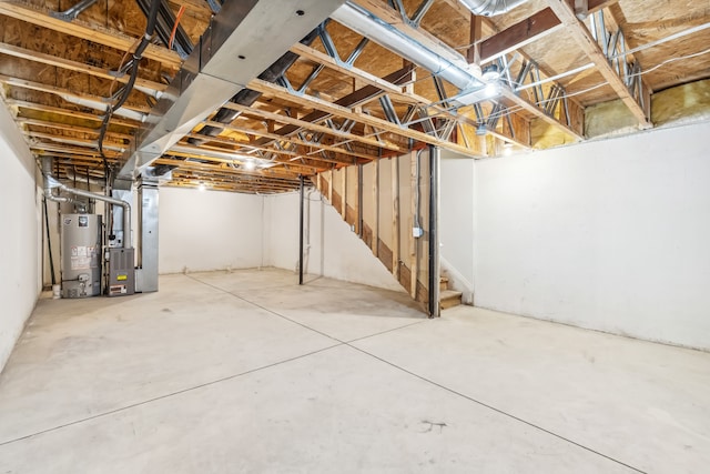 basement with heating unit and water heater