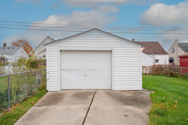 garage with a yard