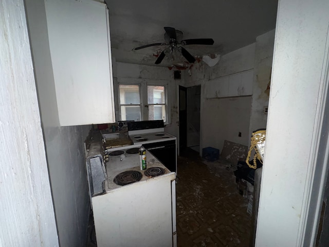 kitchen with white range with electric stovetop and ceiling fan