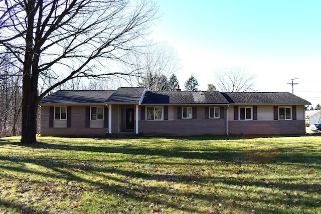 ranch-style house featuring a front lawn