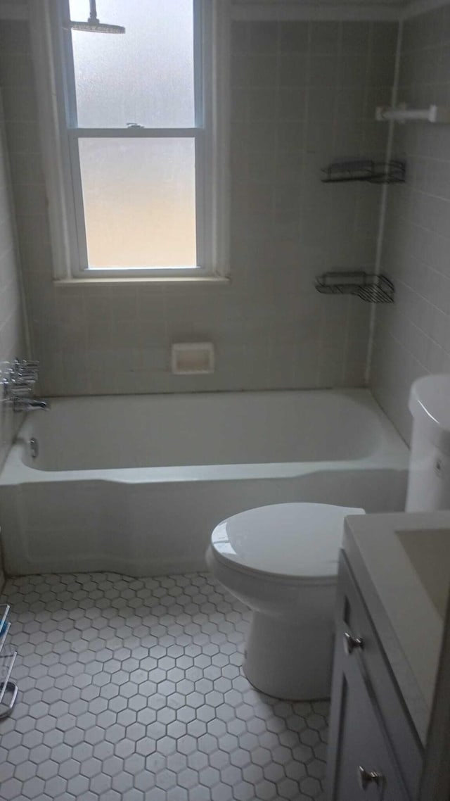 full bath featuring shower / bath combination, vanity, and toilet