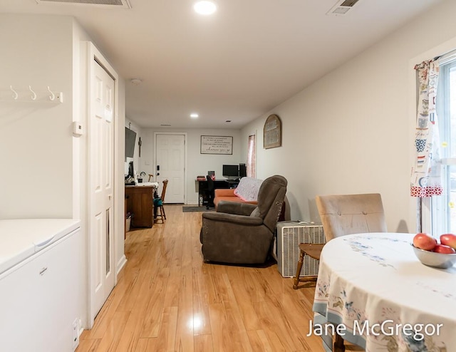 living room featuring light hardwood / wood-style flooring