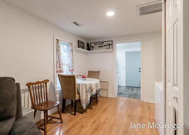 dining room featuring light wood-type flooring