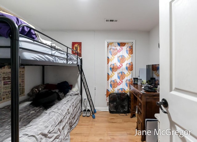 bedroom featuring hardwood / wood-style flooring