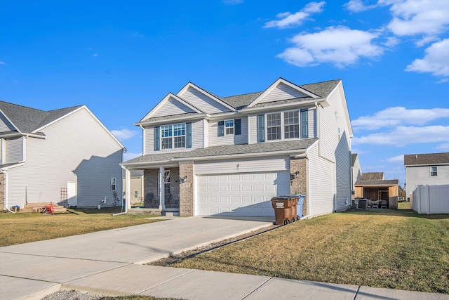 view of front of home featuring central AC unit, a garage, and a front lawn