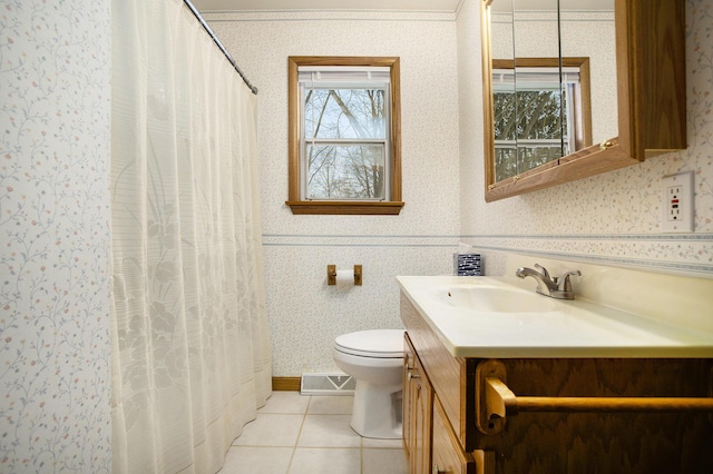 bathroom with a shower with curtain, tile patterned flooring, toilet, vanity, and ornamental molding