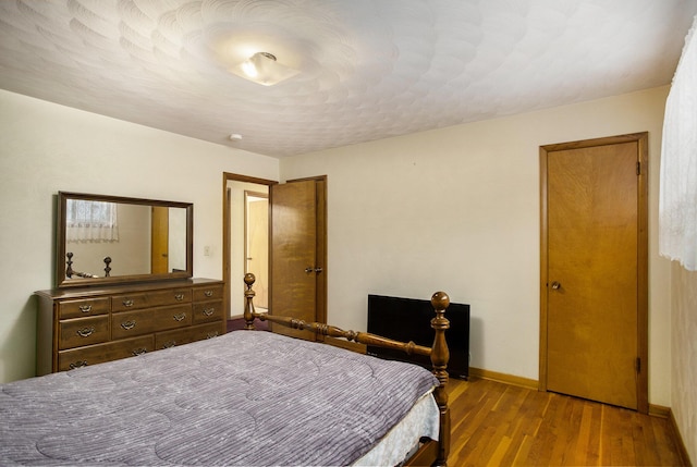 bedroom featuring light hardwood / wood-style flooring