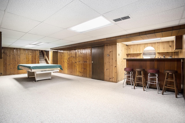 game room featuring a paneled ceiling, carpet floors, billiards, and indoor bar