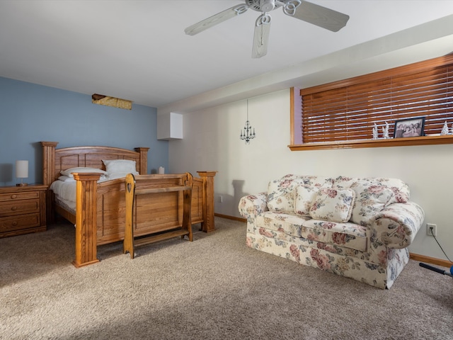 bedroom with ceiling fan and carpet floors