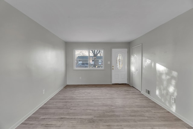 entrance foyer with light hardwood / wood-style floors