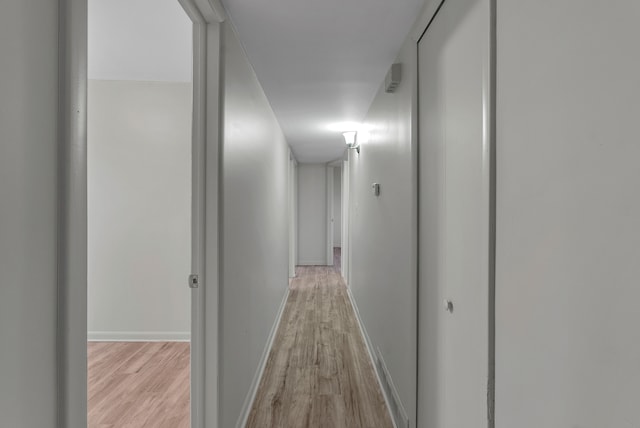 hall featuring light hardwood / wood-style flooring