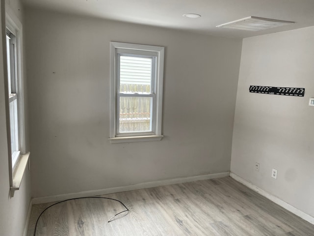 1095 Harding Dr, Grand Blanc, MI 48507 - unfurnished room with wood finished floors and baseboards