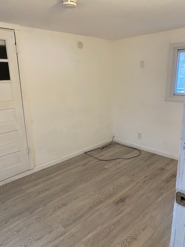 empty room featuring hardwood / wood-style floors