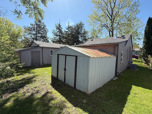 1095 Harding Dr, Grand Blanc, MI 48507 - view of shed with central AC