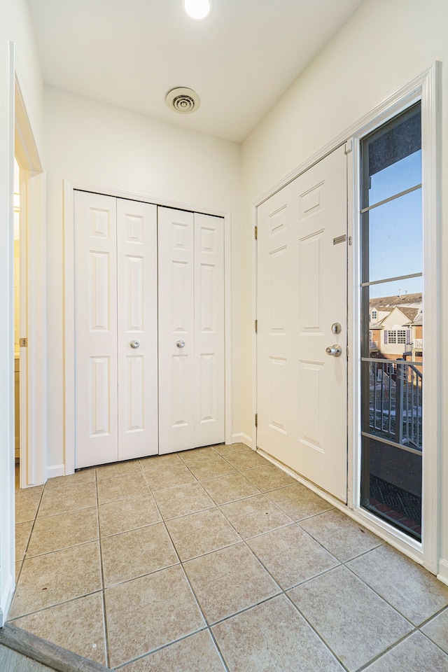 view of tiled foyer