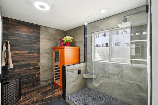 bathroom with a tile shower