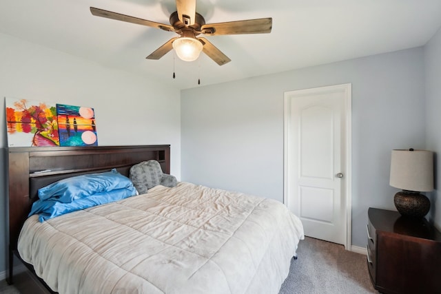 bedroom with ceiling fan and carpet flooring