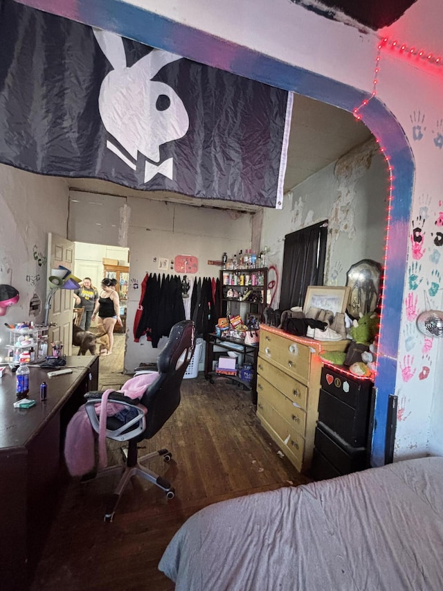 bedroom featuring hardwood / wood-style flooring