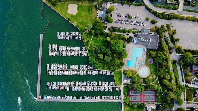 birds eye view of property with a water view