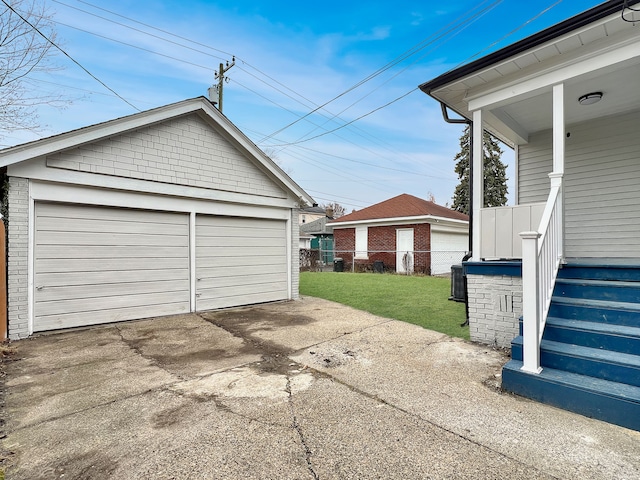 garage with a lawn